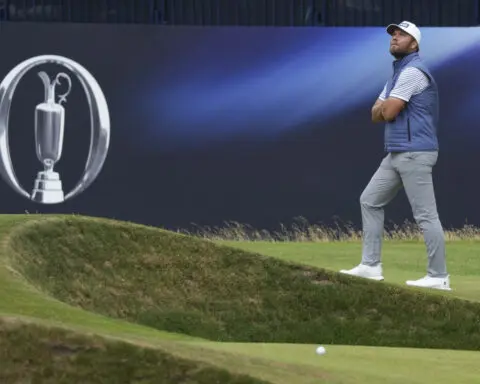 Shane Lowry keeps calm and carries British Open lead at Troon