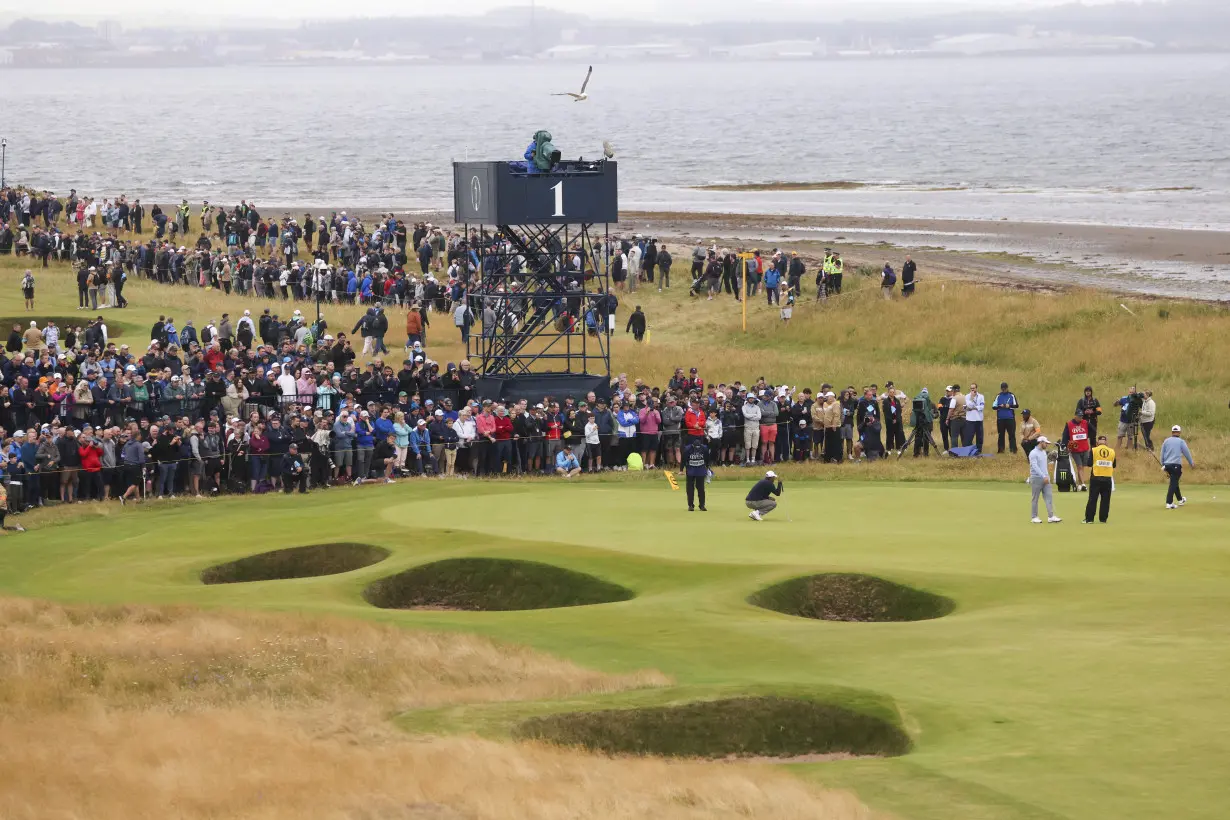 Shane Lowry keeps calm and carries British Open lead at Troon