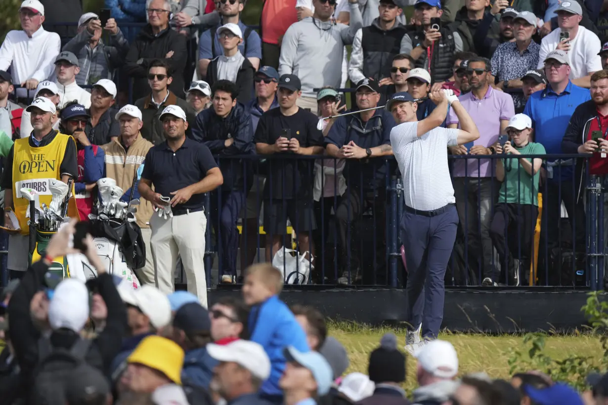 Shane Lowry keeps calm and carries British Open lead at Troon