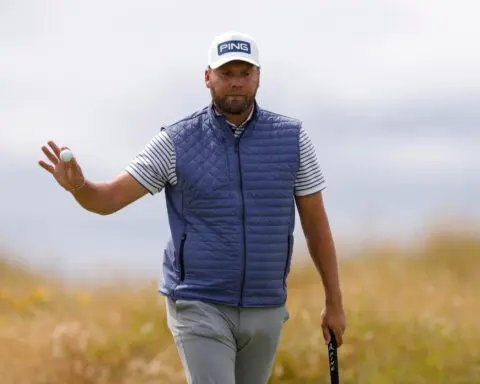 Golf-Brown stays grounded to keep unlikely Open dream alive