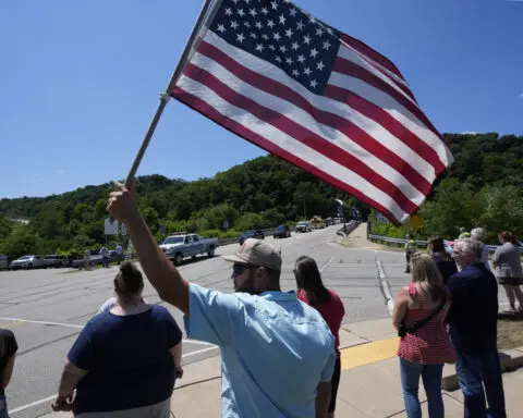 Firefighter killed at Trump rally honored with bagpipes, gun salute and a bugle sounding taps