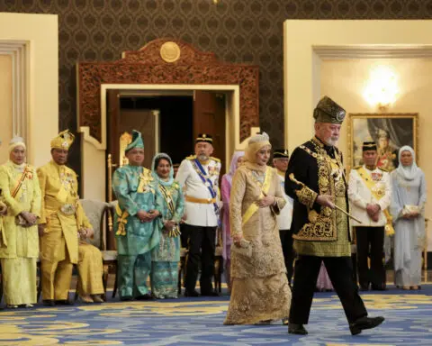 Malaysia honors a new king in coronation marked by pomp and cannon fire
