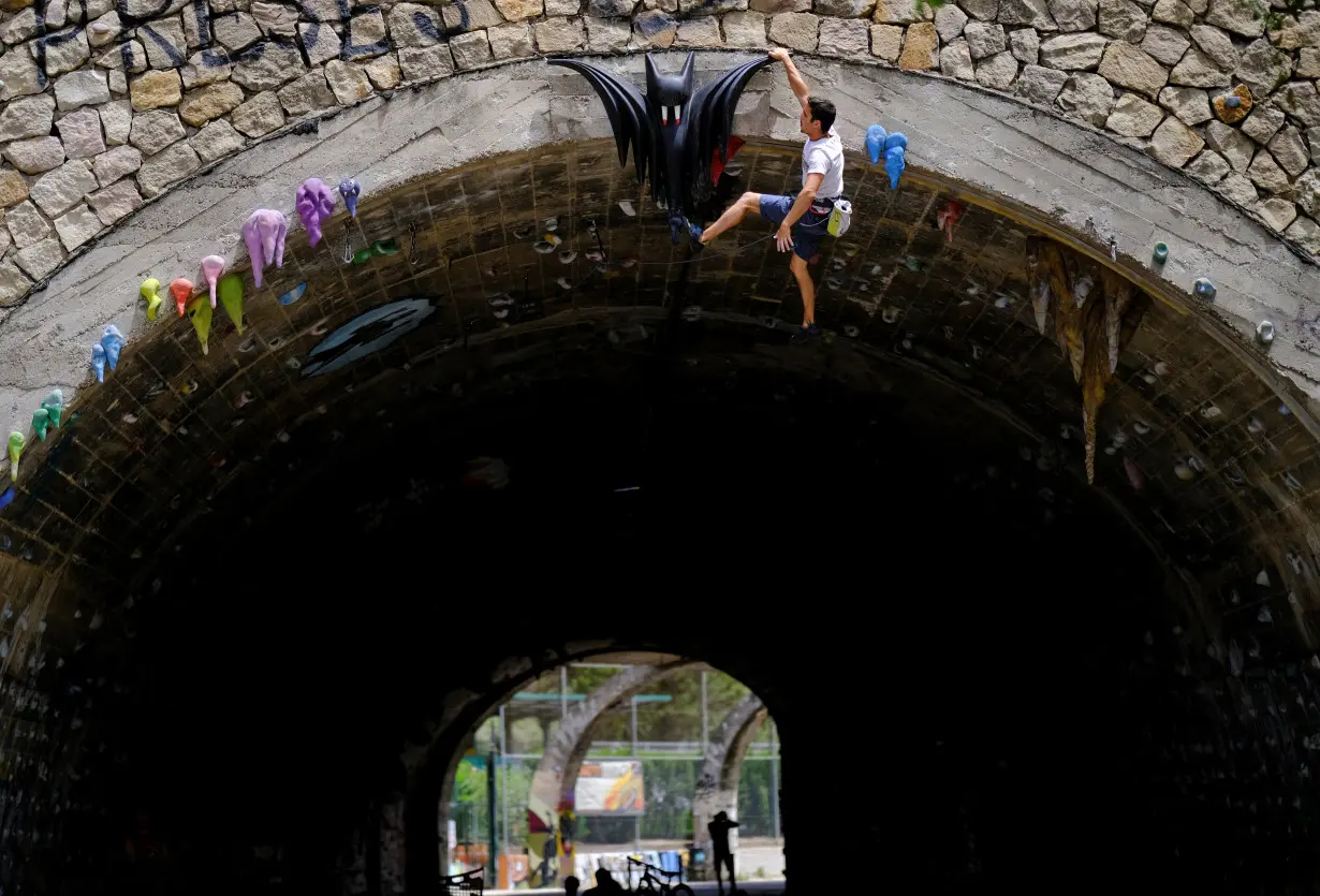 Barcelona's free gym in a tunnel helps popularize climbing