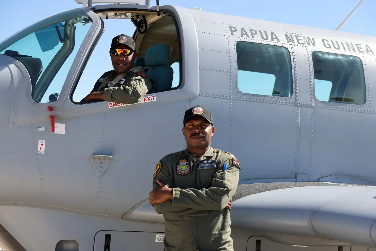 Papua New Guinea Air Force pilots pose during Exercise Pitch Black at RAAF Tindal Base near Katherine