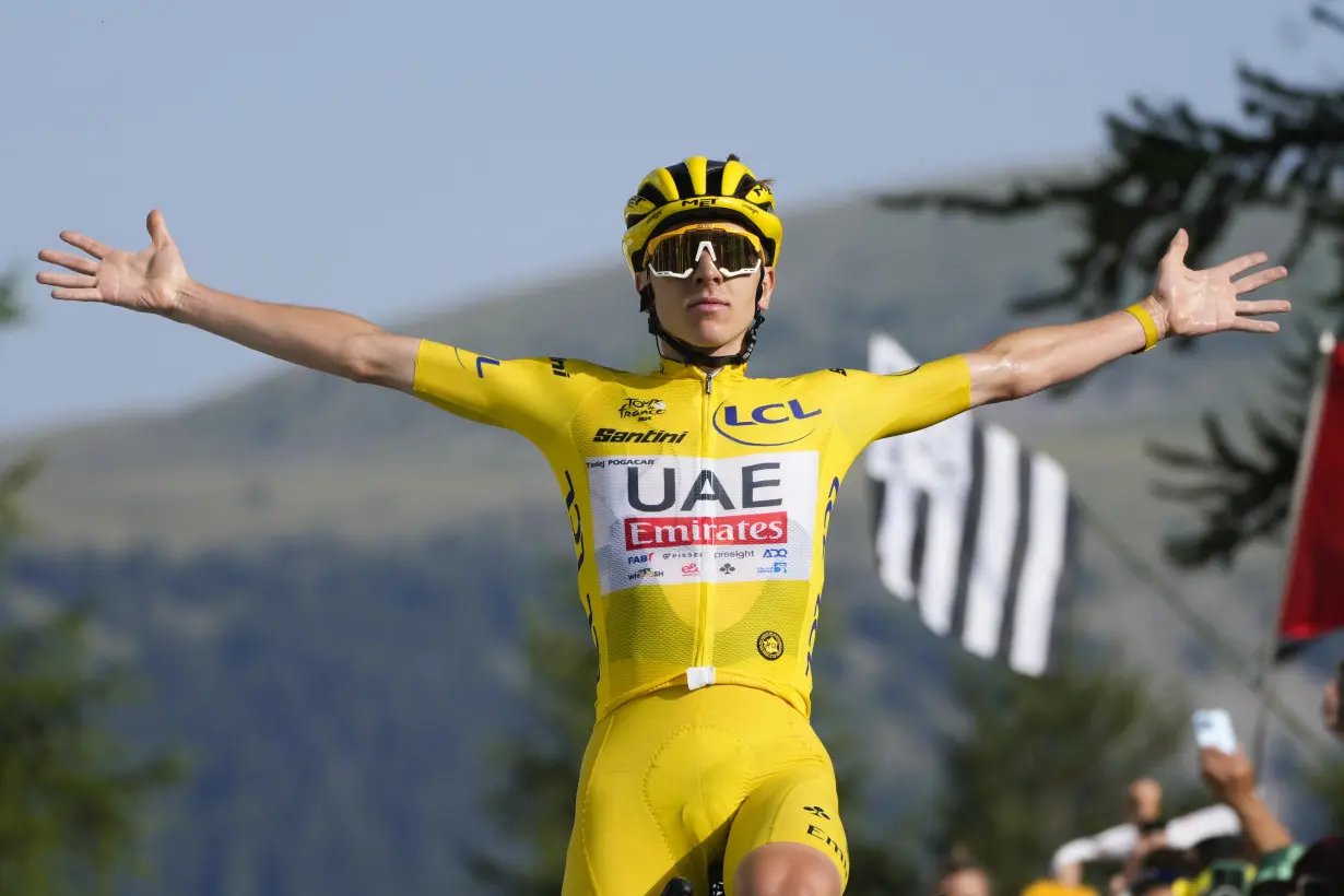 Pogacar edges Vingegaard to add more seconds to Tour de France lead and match a 76-year-old mark