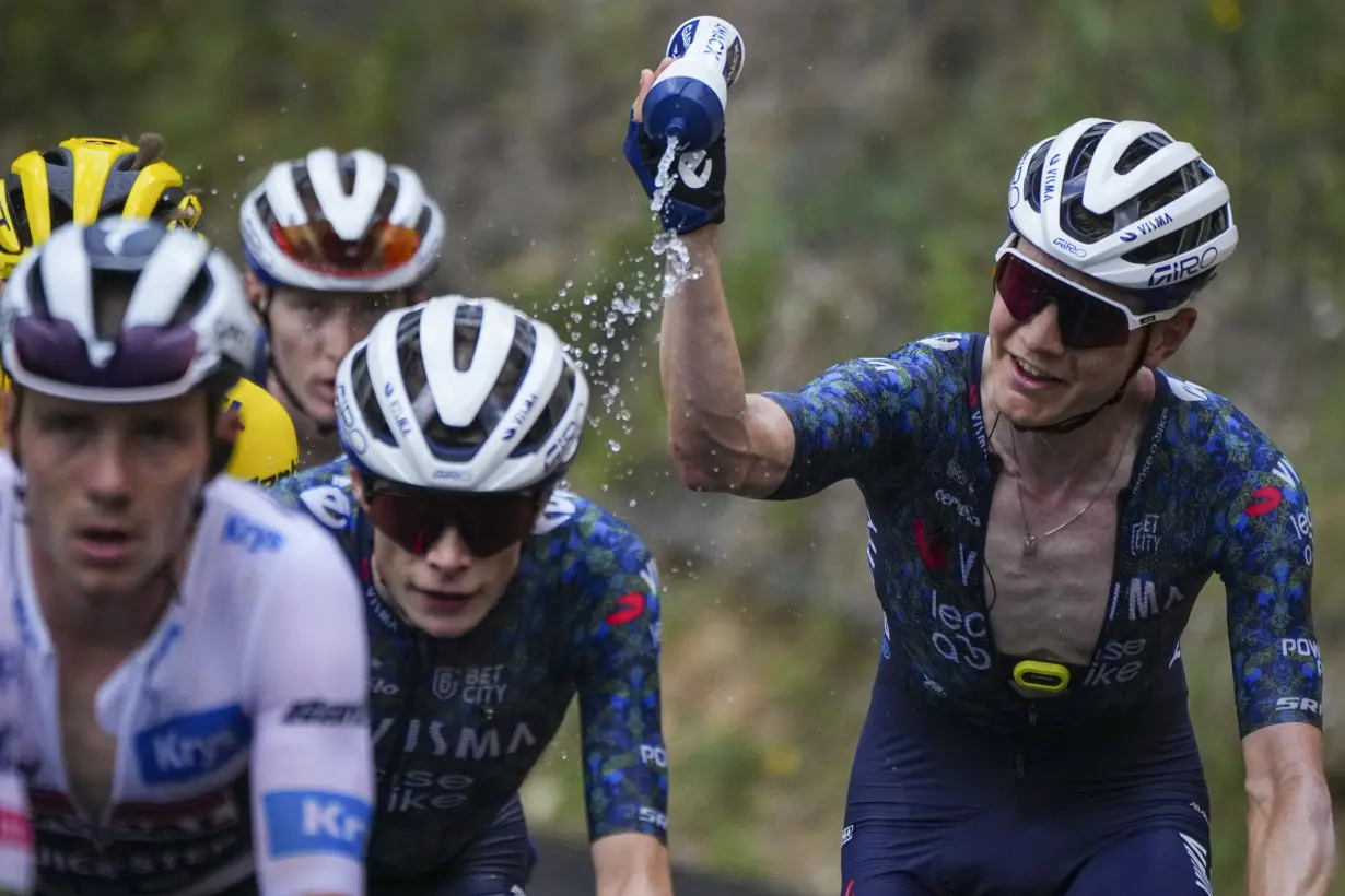 Pogacar edges Vingegaard to add more seconds to Tour de France lead and match a 76-year-old mark