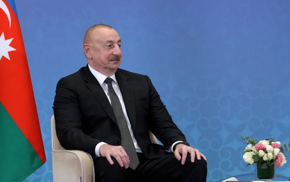 FILE PHOTO: Azeri President Aliyev meets Putin in Astana