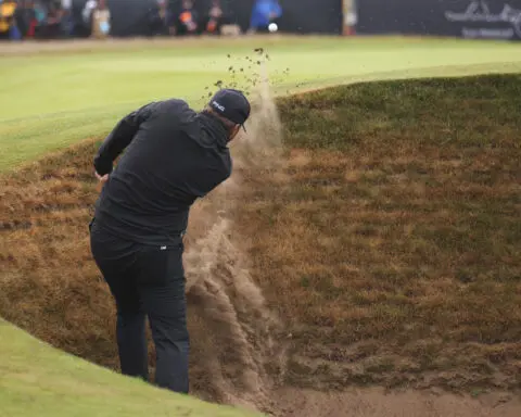 Horschel leads British Open on wild day of rain and big numbers at Royal Troon