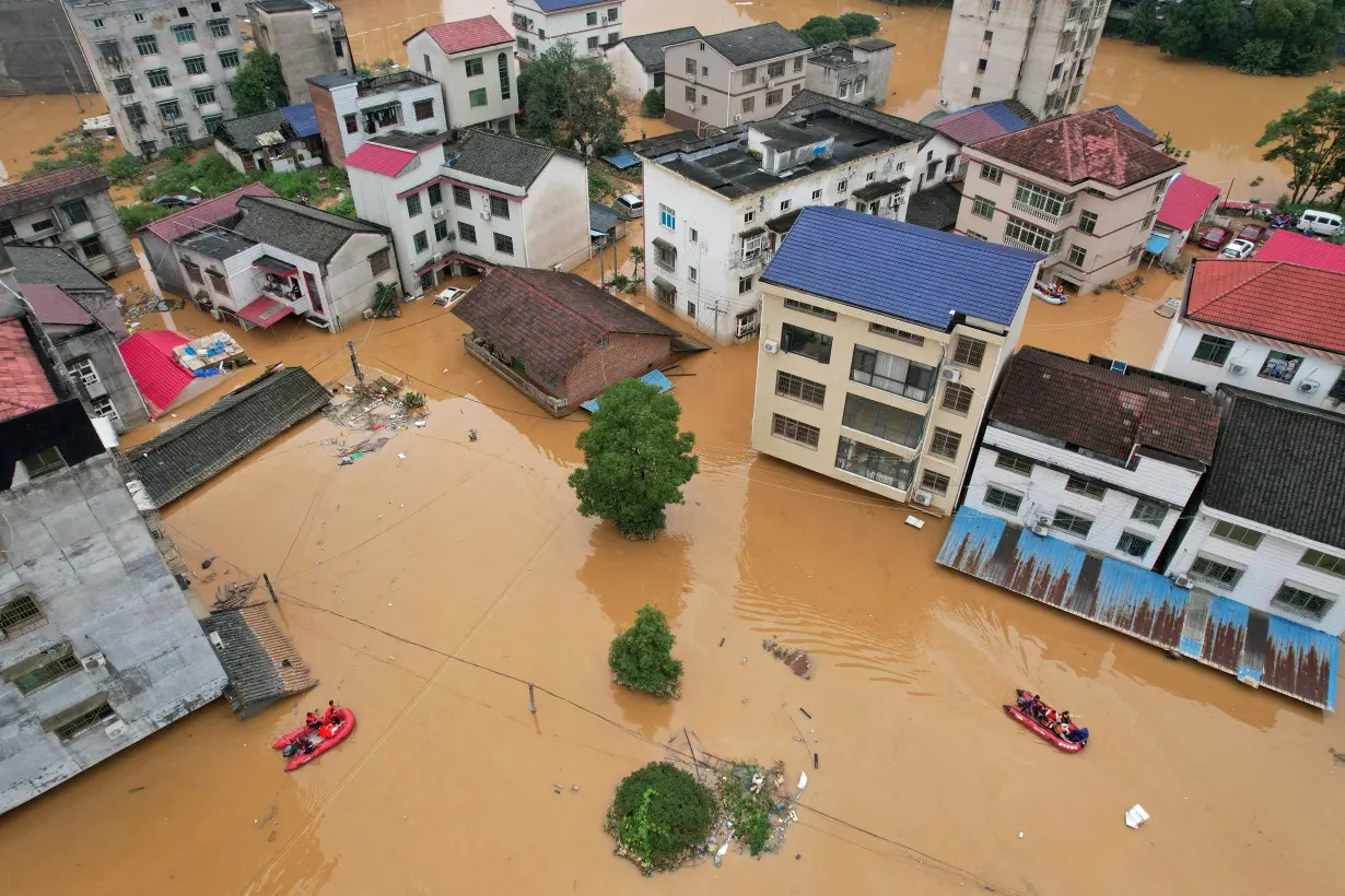 FILE PHOTO: FILE PHOTO: Buildings submerged in floodwaters in Hunan province, China