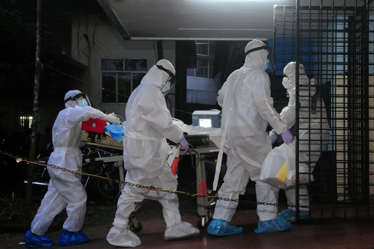 A patient is shifted to an ICU of Nipah isolation ward in Kozhikode Medical College in Kozhikode district