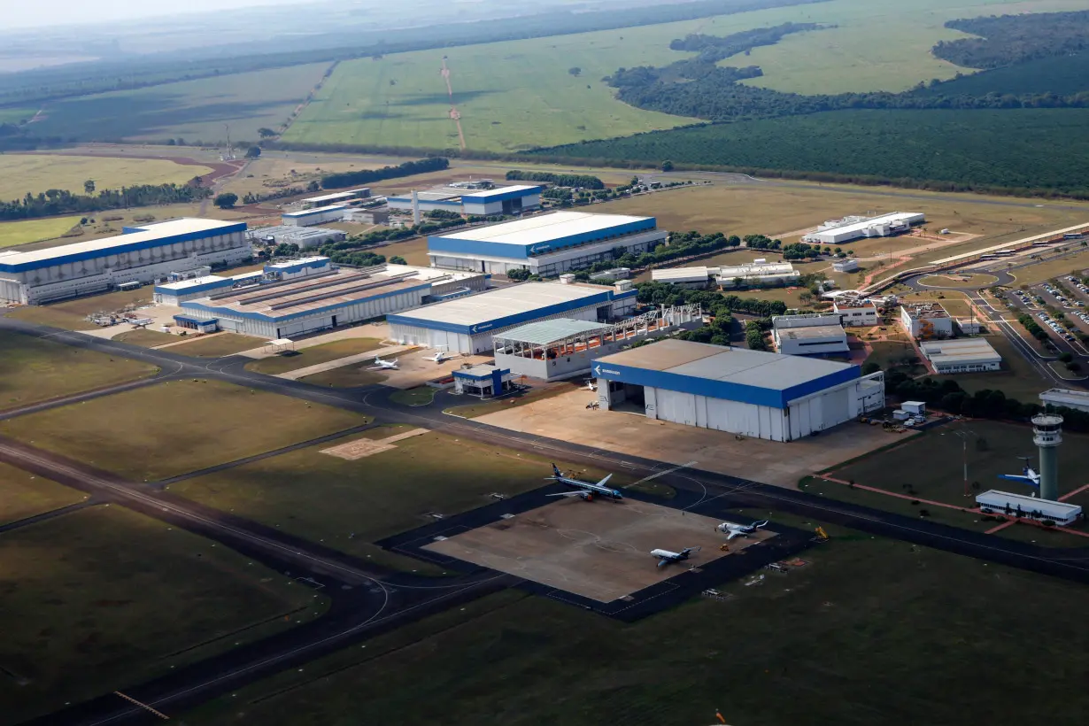 The electric aircraft maker Eve Air Mobility showcases for the first time the full-scale prototype of its electric vertical take-off and landing (eVTOL) aircraft at an event in Gaviao Peixoto