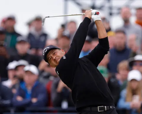 Golf-Imperious Schauffele wins British Open with faultless 65