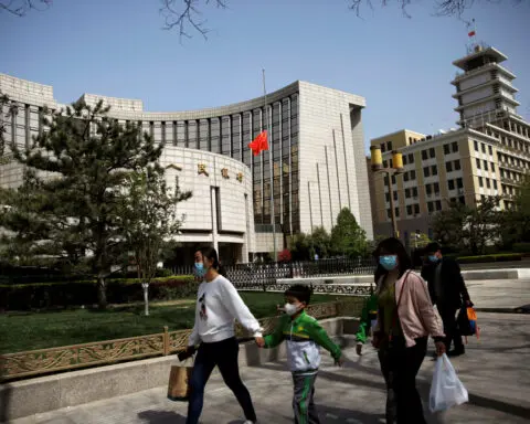 China lowers lending benchmarks after PBOC's surprise rate cut