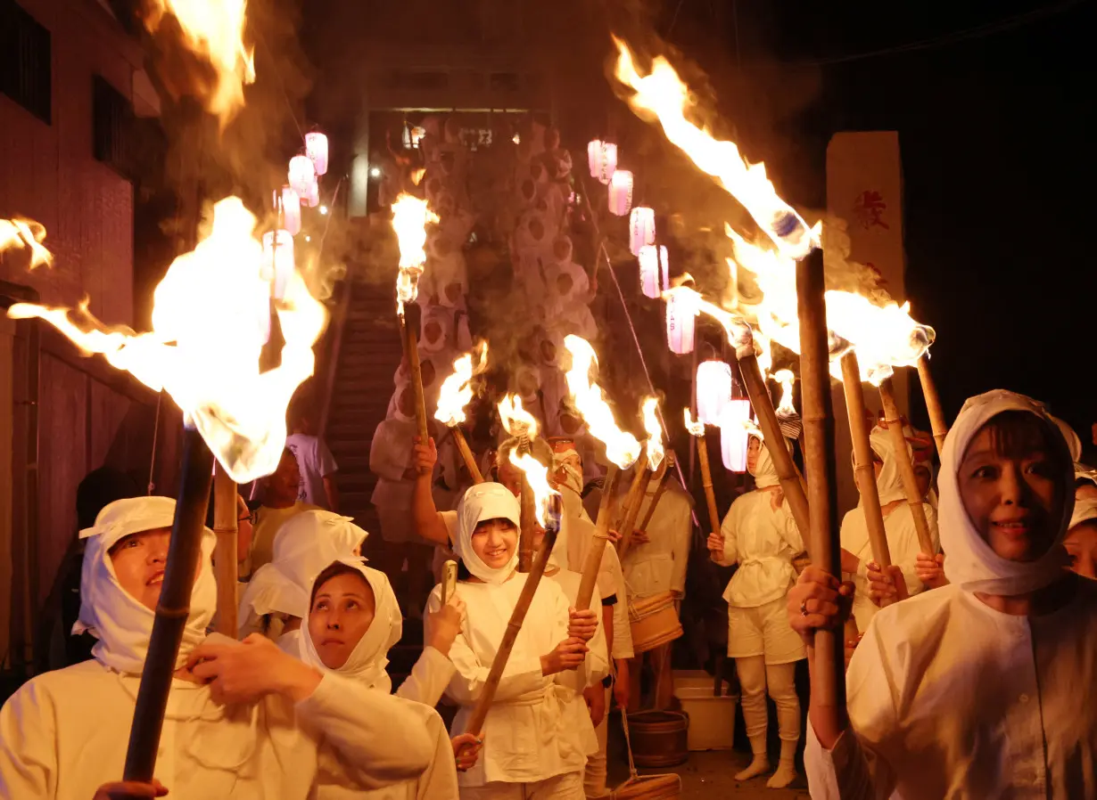 Volunteers in the white-clad of 