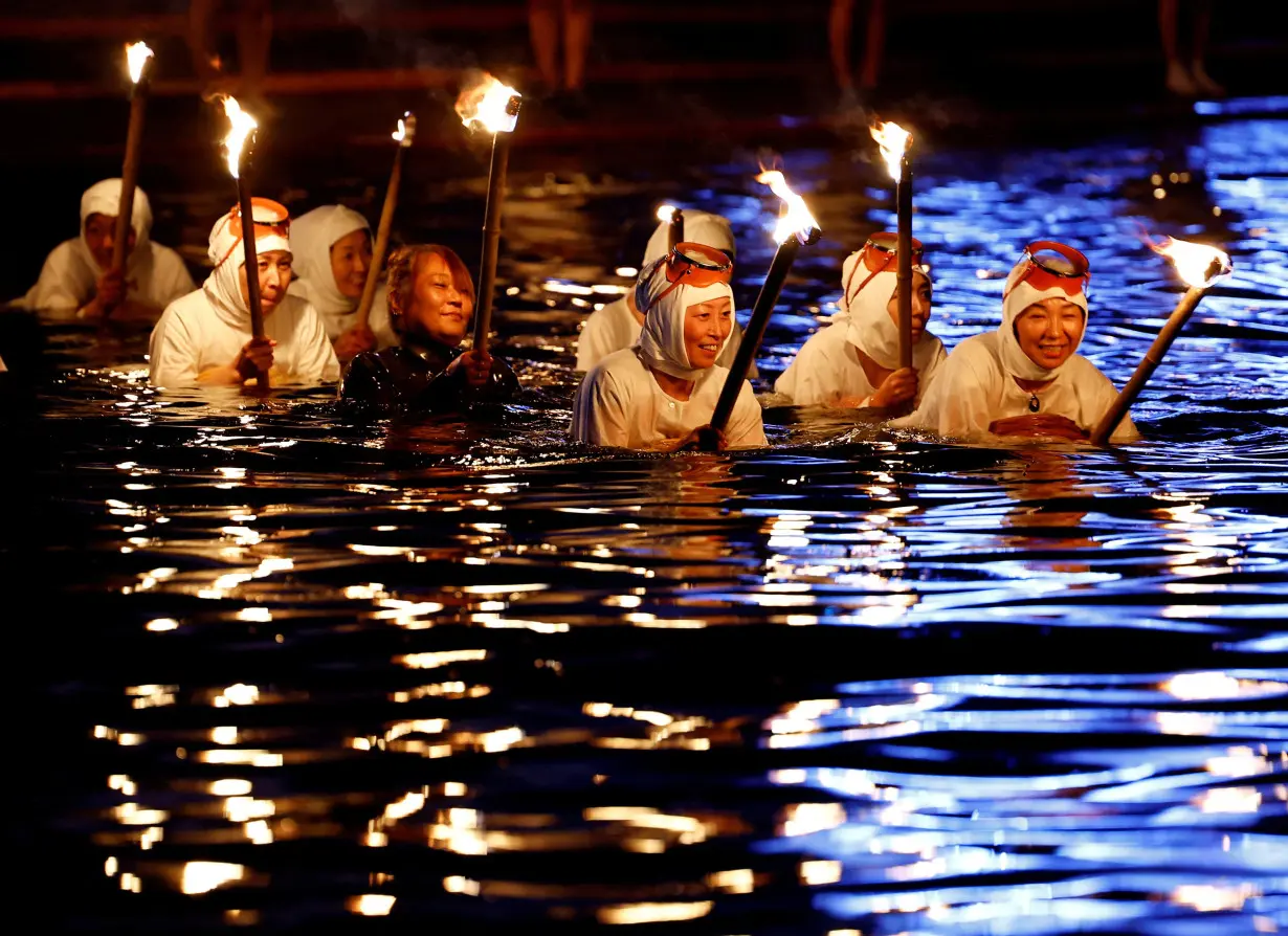 Short of female free divers, Japanese sea festival turns to volunteers