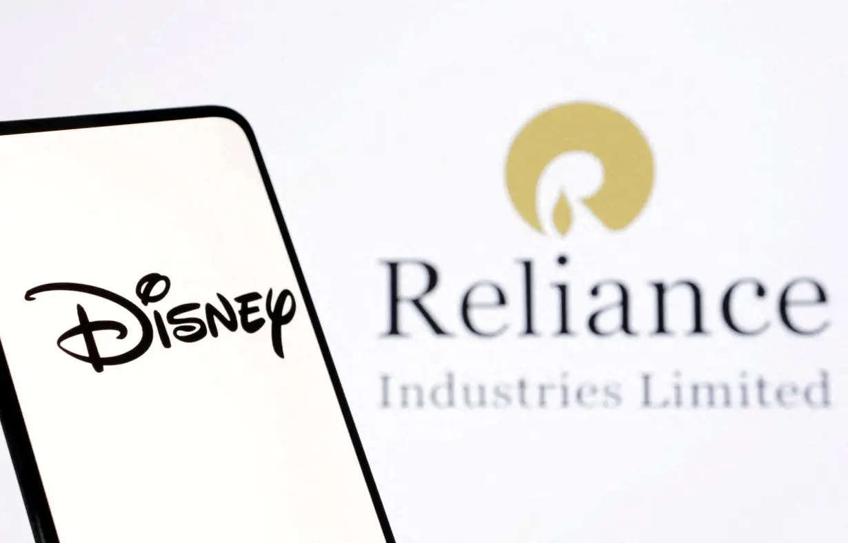 FILE PHOTO: FILE PHOTO: Illustration shows Disney and Reliance logos