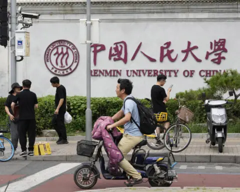A top Chinese university fires a professor after a student accused him of sexual harassment
