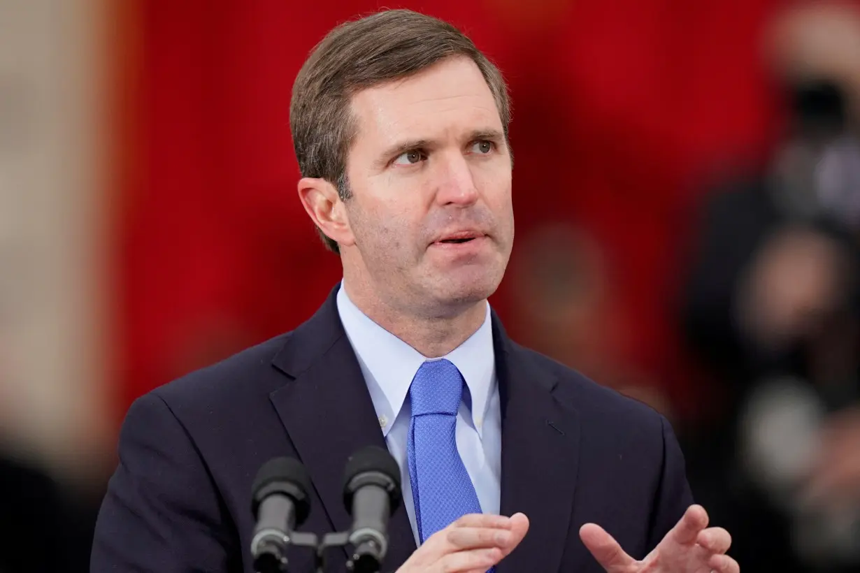 FILE PHOTO: Kentucky's Democratic Governor Andy Beshear speaks to the crowd gathered during his public swearing-in ceremony in Frankfort