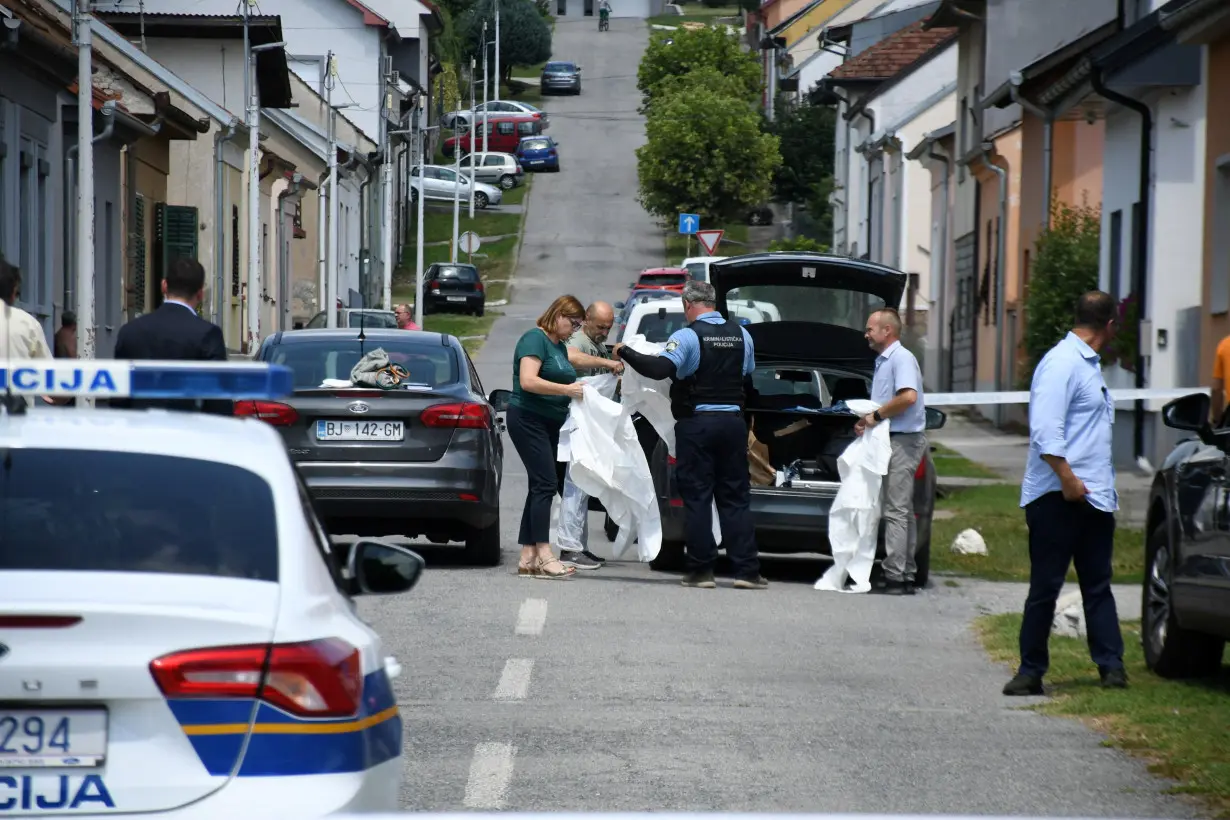 Police secure a crime scene in Daruvar