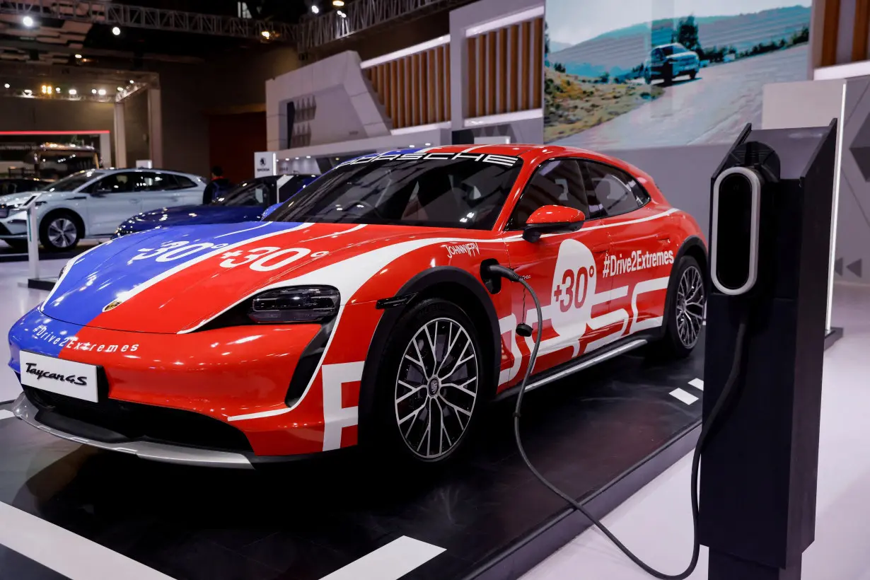 FILE PHOTO: Porsche's electric vehicle Taycan 4s is seen on display at Bharat Mobility Global Expo organised by India's commerce ministry at Pragati Maidan in New Delhi