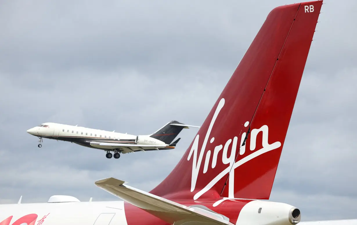 Branding for Virgin Atlantic is seen on a tail fin at Farnborough International Airshow, in Farnborough