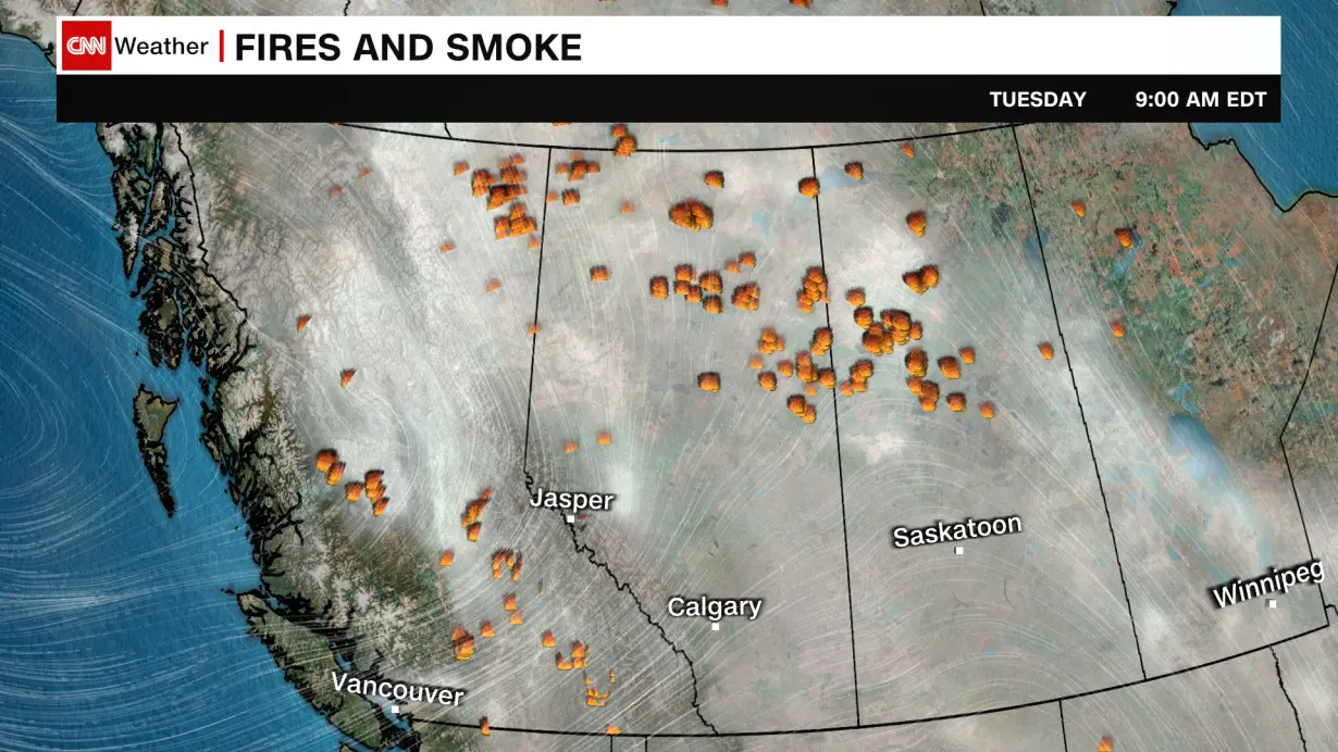 Famed national park evacuated in Canada as fires threaten the area