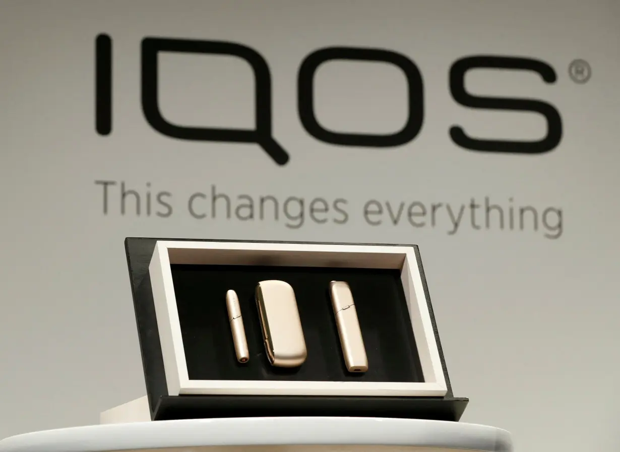 FILE PHOTO: Philip Morris new IQOS 3 devices are displayed during a news conference by its International's CEO Andre Calantzopoulos in Tokyo