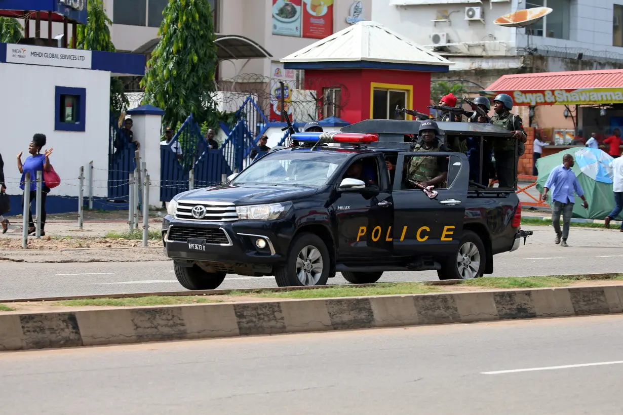 FILE PHOTO: A police vehicle drives along Banex road