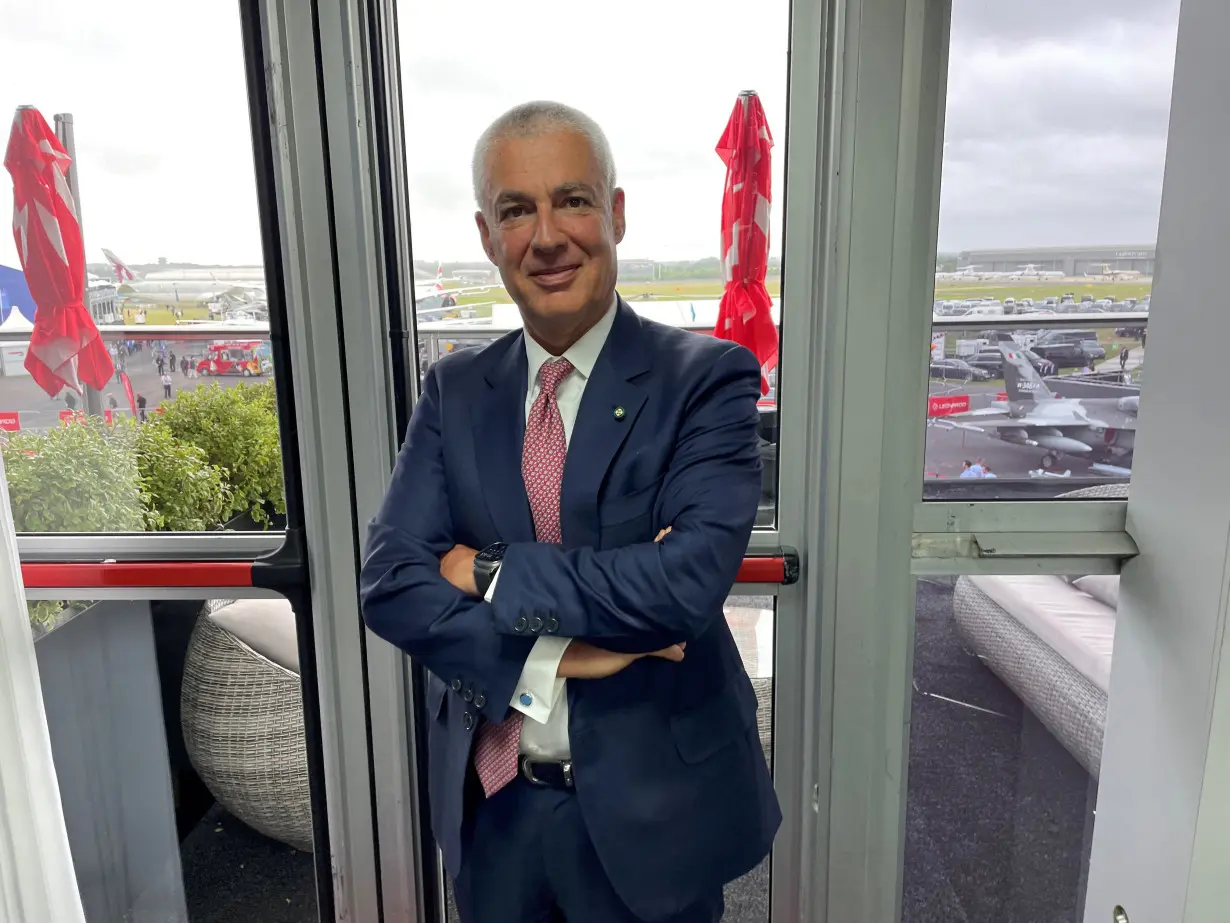 Leonardo's Co-General Manager Lorenzo Mariani poses for a photo at the Farnborough Airshow in Farnborough