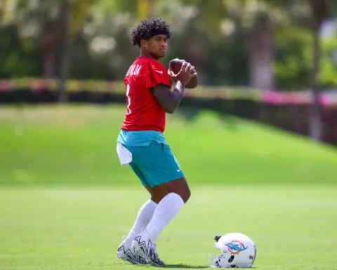 Dolphins QB Tua Tagovailoa at camp with contract in flux