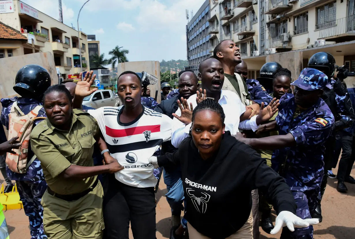 Ugandan security forces detain young protesters marching in Kampala