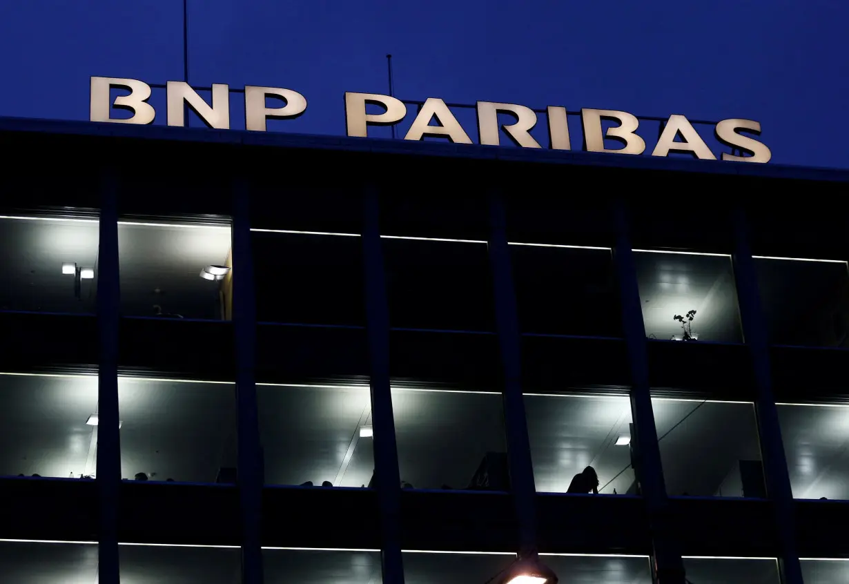 FILE PHOTO: A BNP Paribas sign is pictured on a building of the bank in Geneva