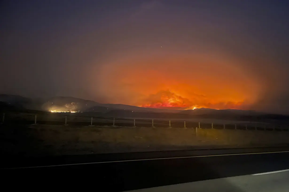 Wildfires threaten communities in the West as Oregon fire closes interstate, creates its own weather