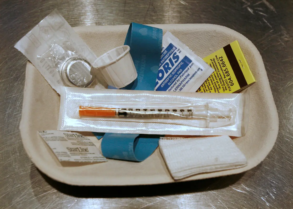 FILE PHOTO: Small kit of supplies waits to be used by drug addicts visiting safe injection site in Vancouver