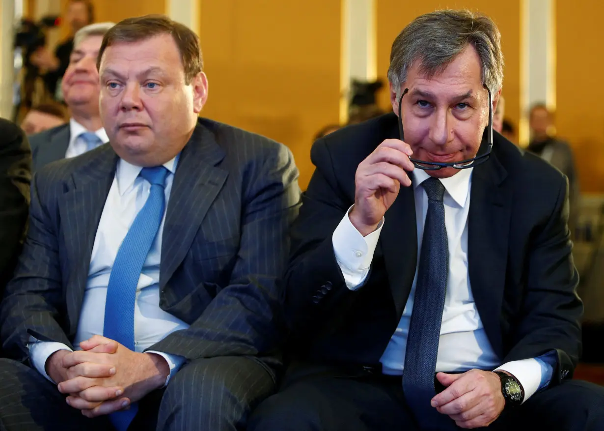 FILE PHOTO: Businessmen Petr Aven (R) and Mikhail Fridman attend the Week of Russian Business in Moscow in 2017