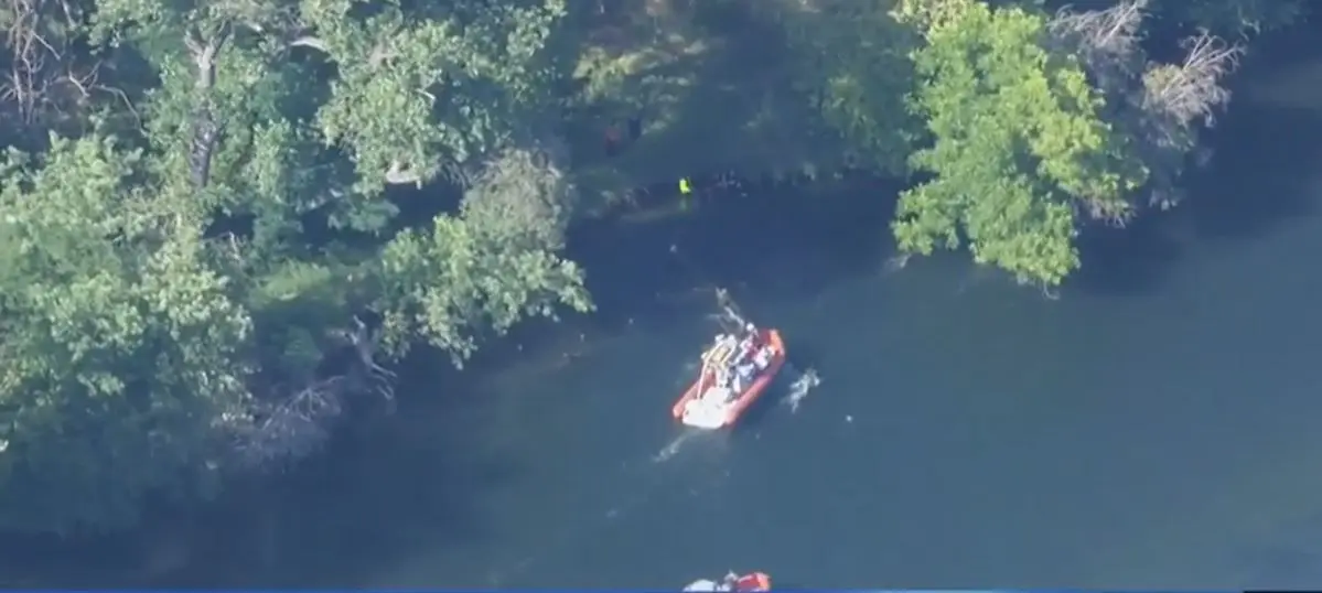 LiveCopter 3 shows firefighters rescue two people trapped by tree on American River