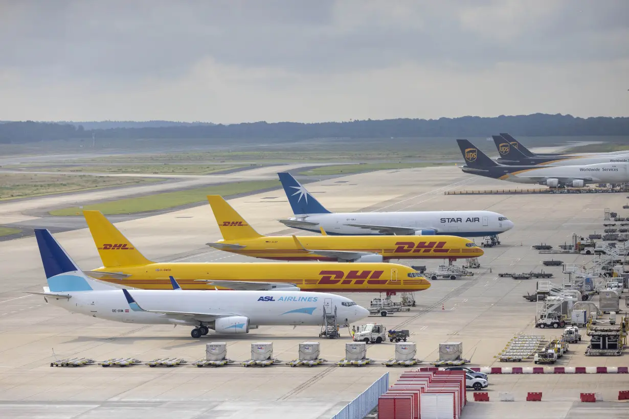 Climate activists glue themselves to a taxiway at Cologne-Bonn Airport, flights suspended