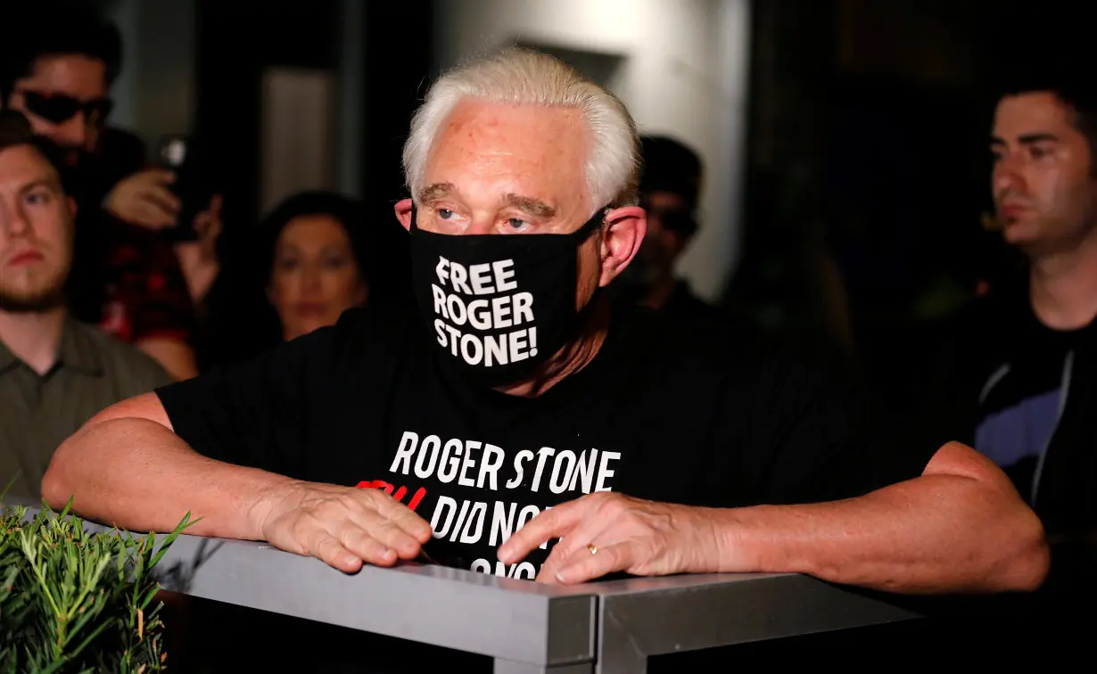 Roger Stone reacts after Trump commuted his federal prison sentence in Fort Lauderdale