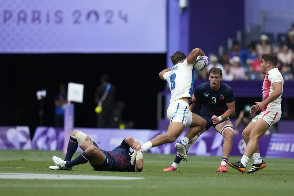 Uzbekistan loses the match but wins over crowd as soccer competition kicks off Paris Olympics