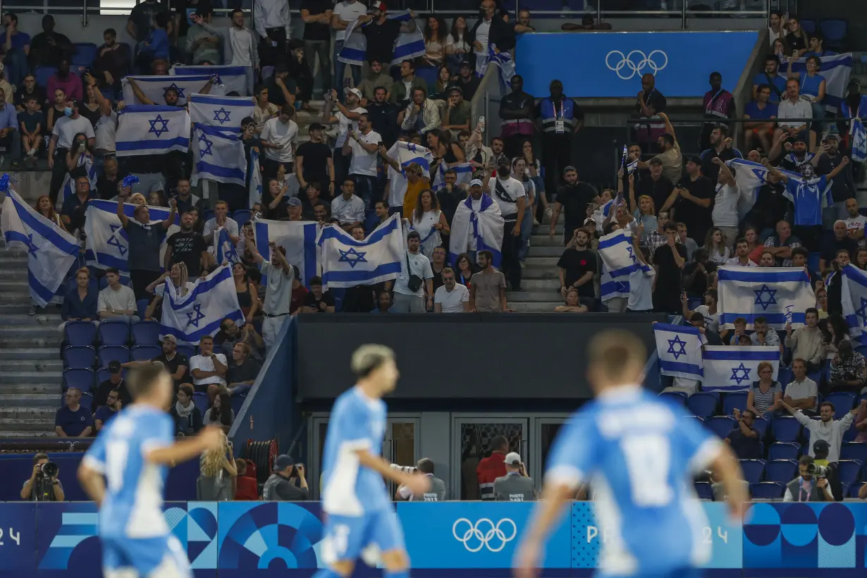 Uzbekistan loses the match but wins over crowd as soccer competition kicks off Paris Olympics