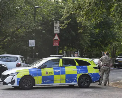 Man arrested after British soldier was stabbed and seriously hurt in attack near barracks