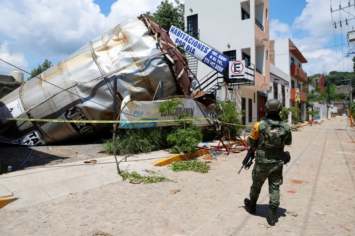 Authorities work at the area of a blast at Jose Cuervo plant, in Tequila