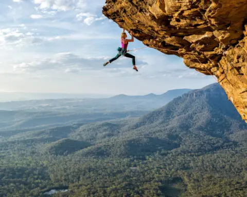 The photographer capturing climbers at dizzying heights