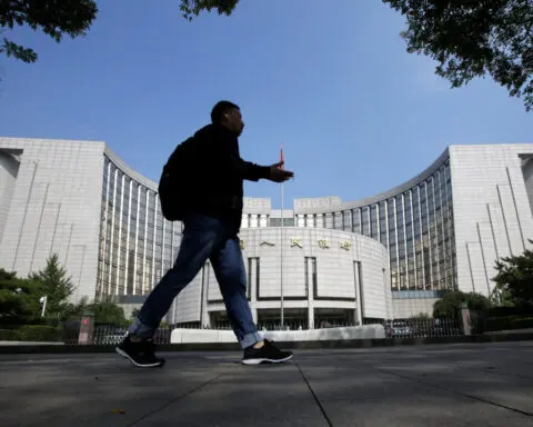 China central bank unexpectedly conducts medium-term loan operation, cuts interest rate