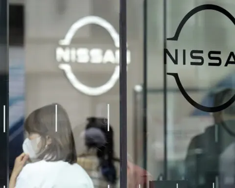 Japanese automaker Nissan lowers its profit forecast amid incentive, inventory woes