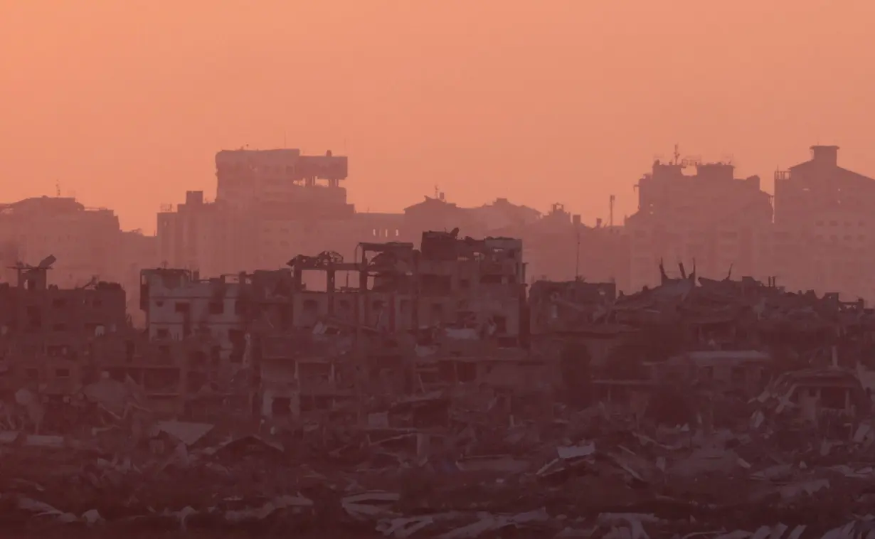 A view of Gaza during sunset, amid the Israel-Hamas conflict, near the Israel-Gaza border