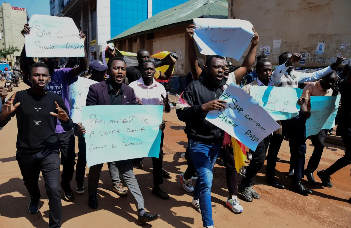 FILE PHOTO: Ugandan security forces detain young protesters marching in Kampala