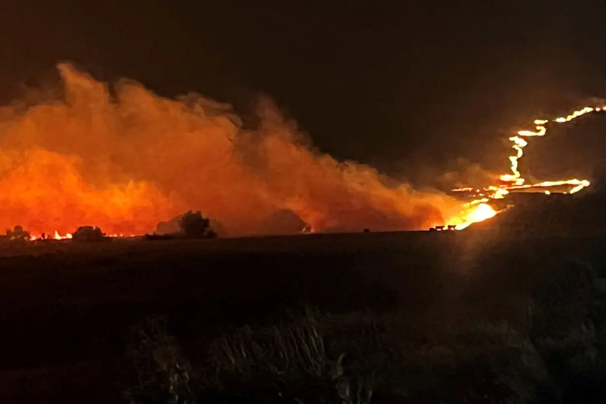 Largest active wildfire in the US burns in Oregon, forcing evacuations and creating its own weather