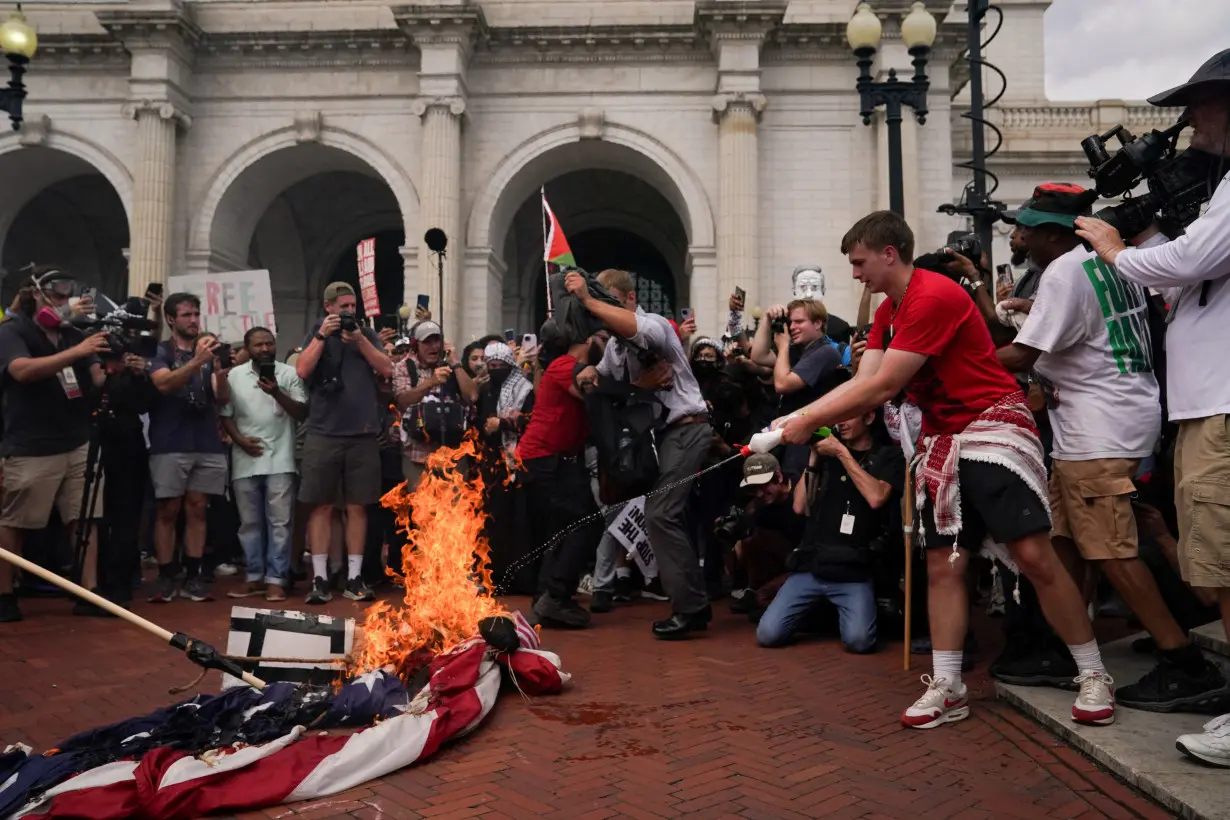 FILE PHOTO: Protesters gather for Israeli PM Netanyahu's address to Congress in Washington