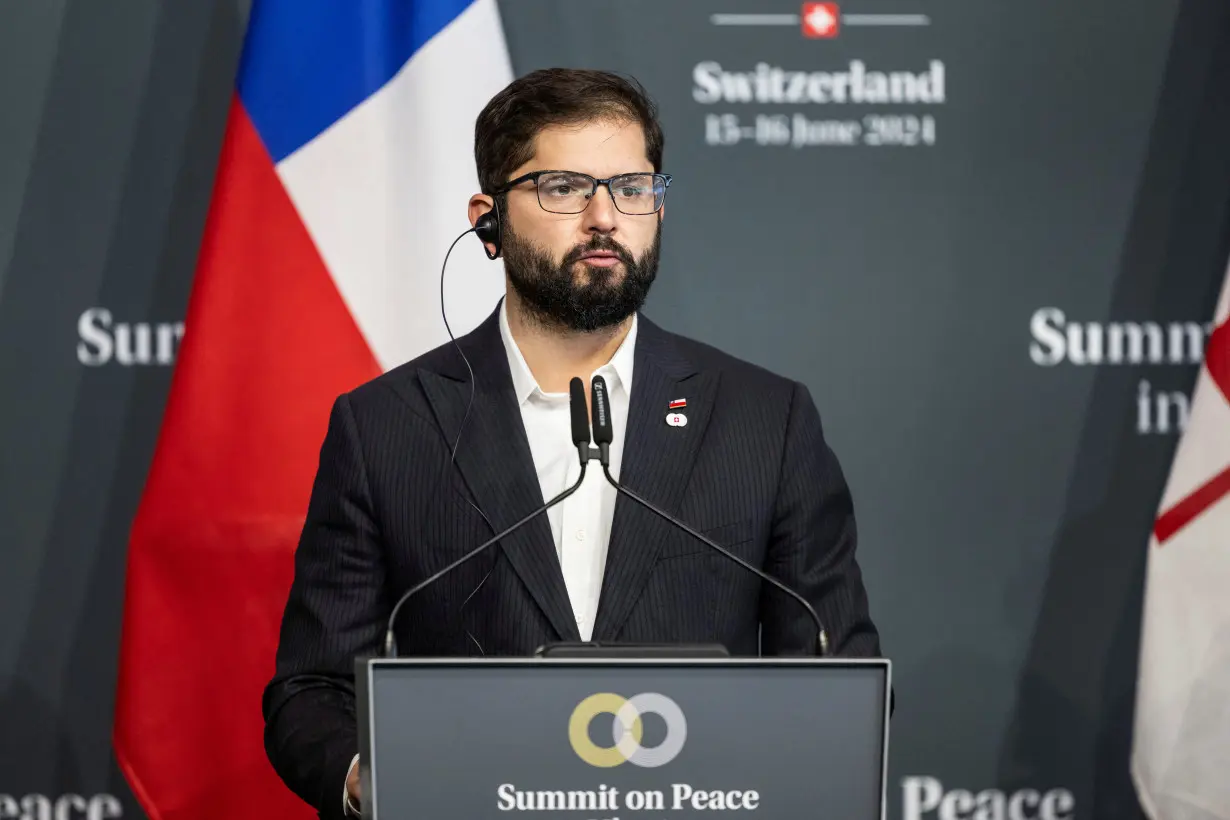 FILE PHOTO: President Gabriel Boric of Chile speaks during a press conference